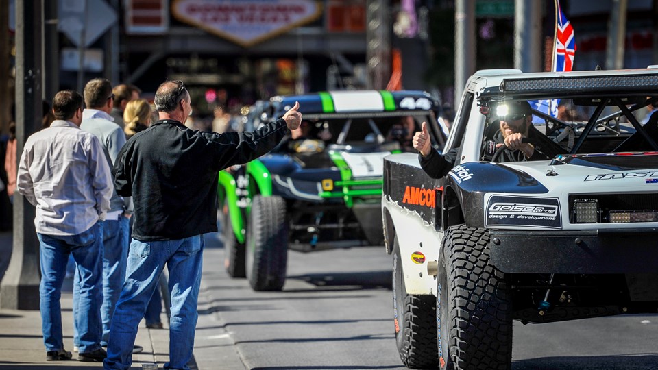 Race fans greet the drivers in the Mint 400 4 Wheel Parts Vehicle Procession