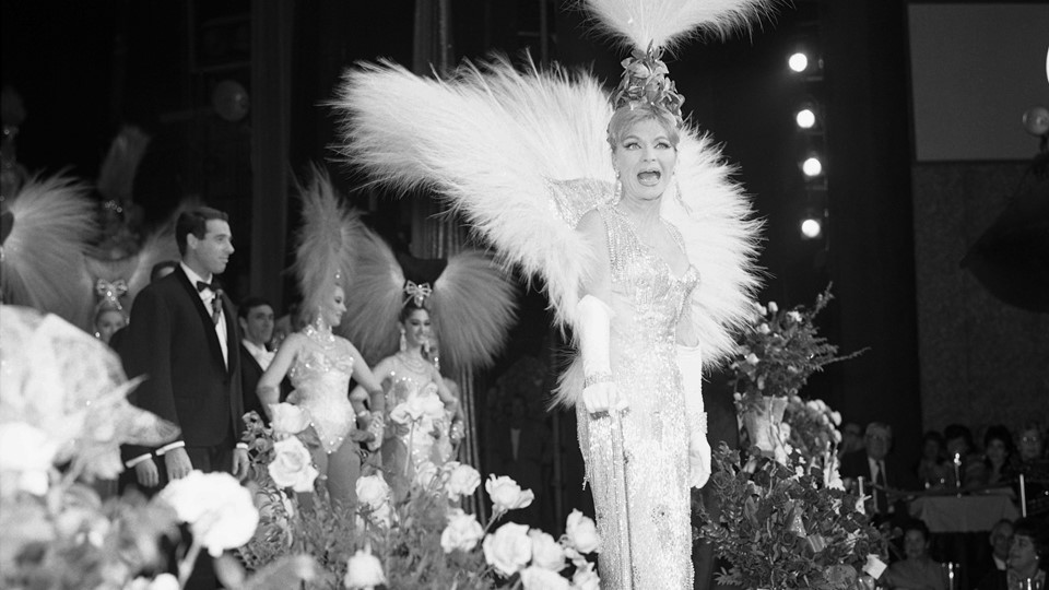 Line Renaud onstage for the premiere of producer Fredric Apcar's Casino de Paris