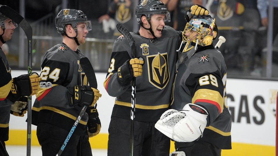 Vegas Golden Knights defenseman Brayden McNabb (3) congratulates Vegas Golden Knights goalie Marc-Andre Fleury (29)
