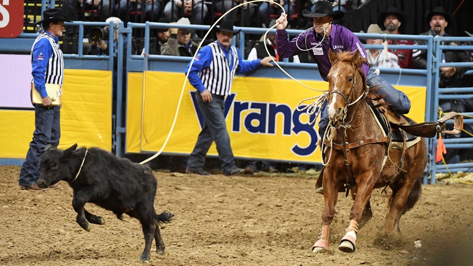 Timber Moore from Aubry, Texas, competes in tie-down roping