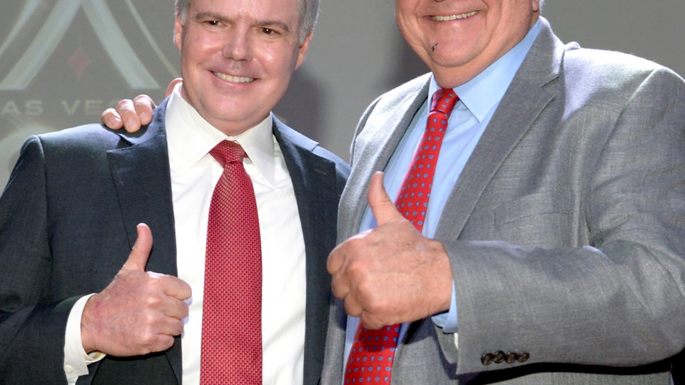 Jim Murren (l) Chairman and CEO of MGM Resorts International and Clark County Commissioner Steve Sisolak, wearing the ne