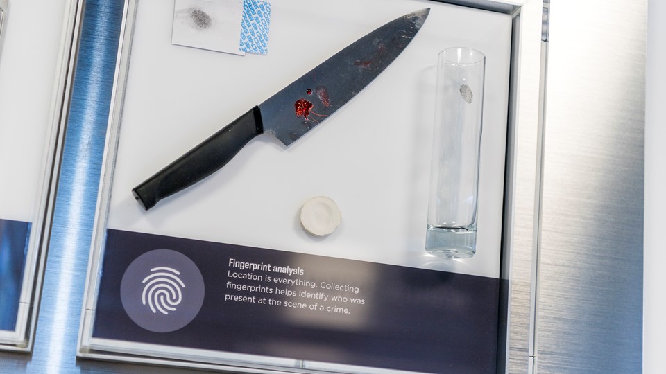 An exhibit introduces guests to fingerprint evidence in the Crime Lab at the Mob Museum