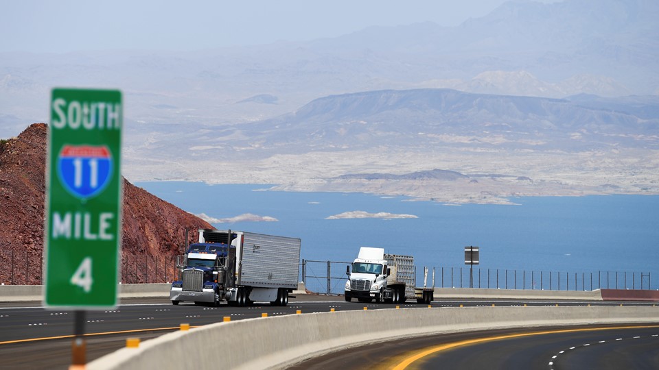 Traffic travels north on Interstate 11 after the grand opening of a new section of the highway