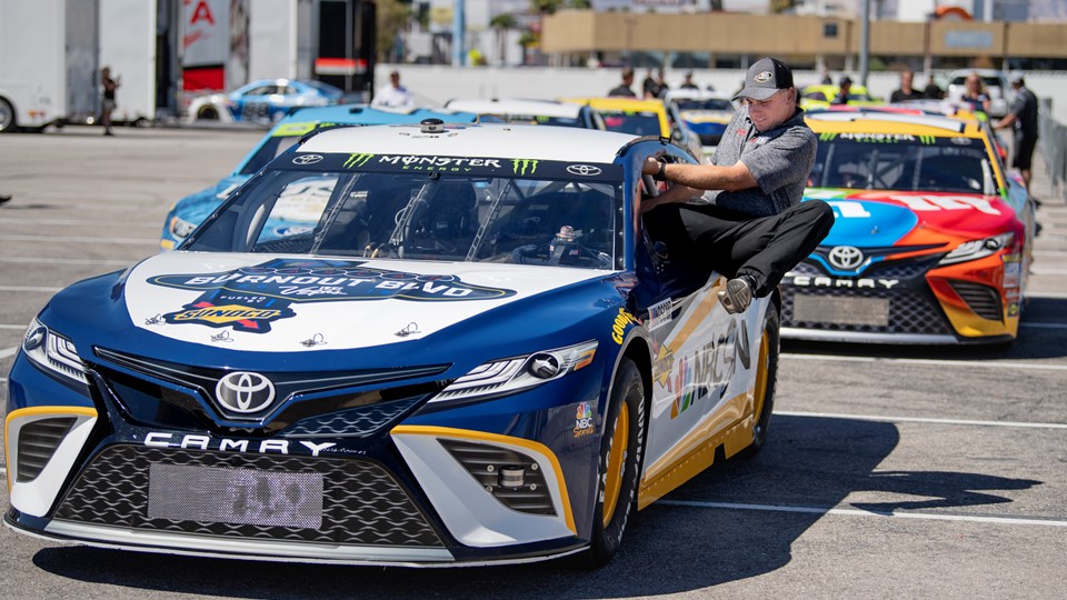 Louie Ellis of Gaunt Racing climbs into the NBCSN lead car in preparation for the 2018 NASCAR Burnout Blvd