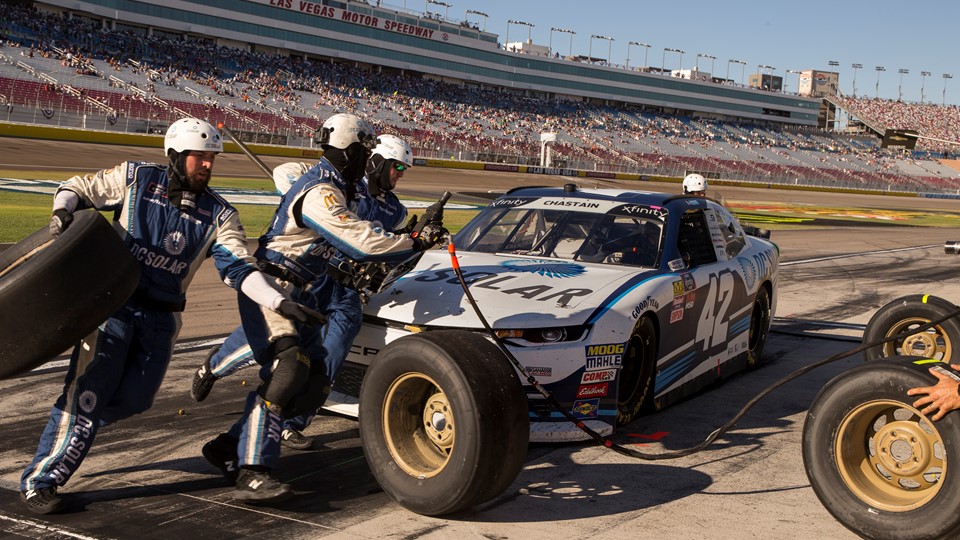 The pit crew for Ross Chastain #42, help him maintain his lead