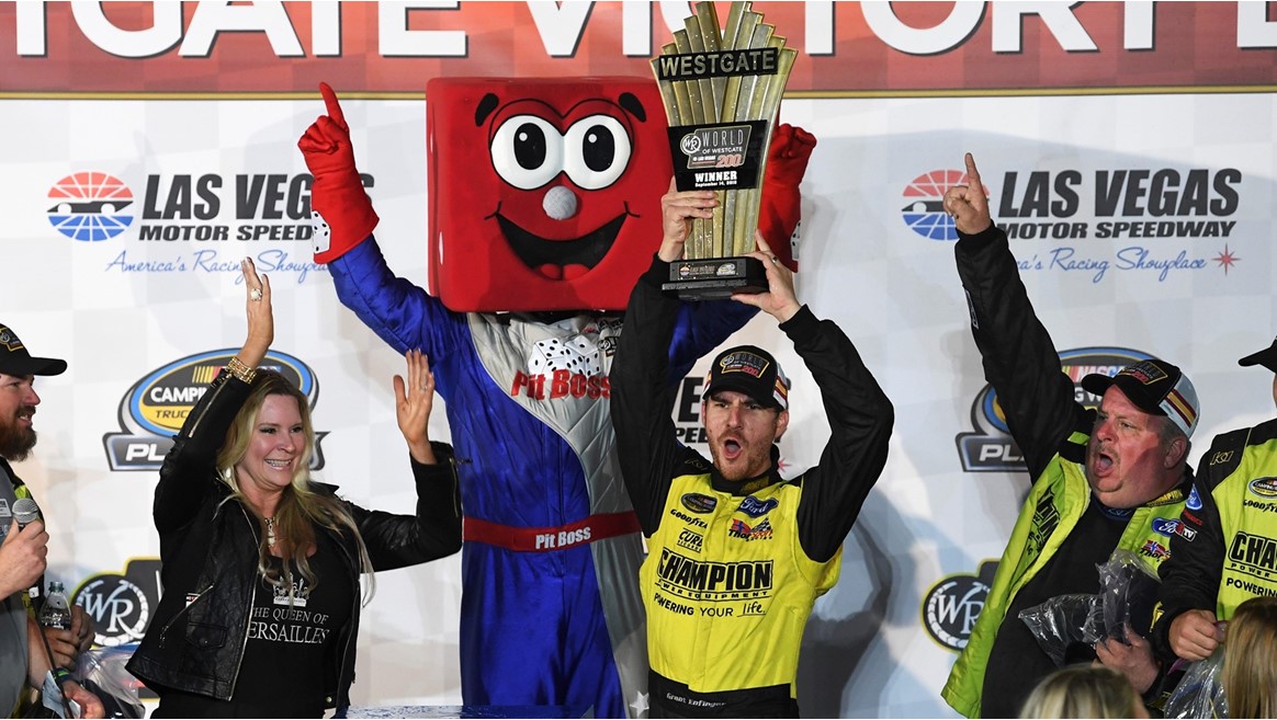 Grant Enfinger (98) celebrates his victory in the NASCAR Camping World Truck Series World of Westgate 200