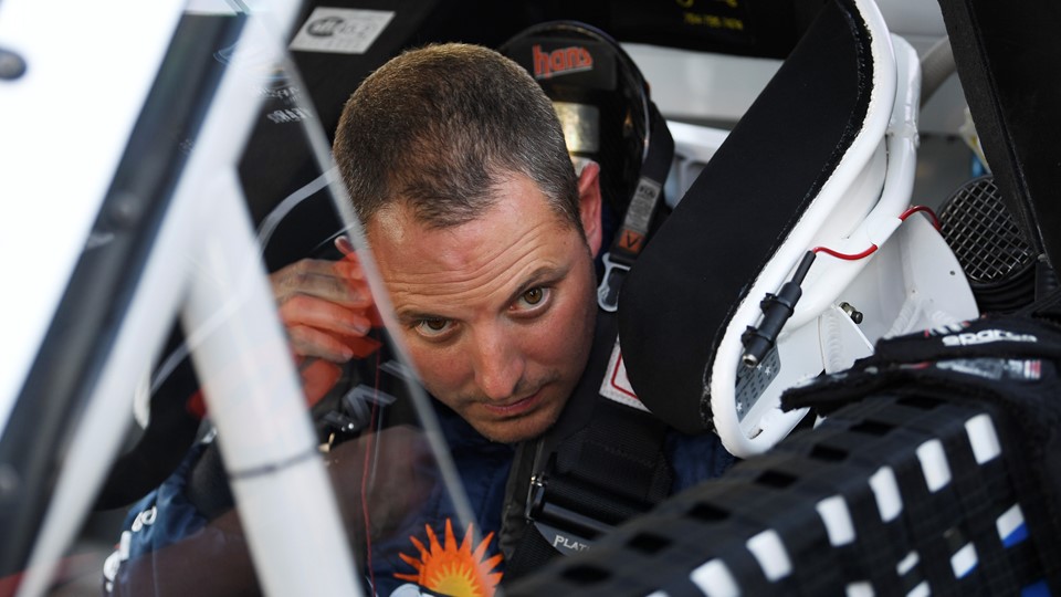 Johnny Sauter (21) Allegiant Chevrolet Silverado puts in his ear piece