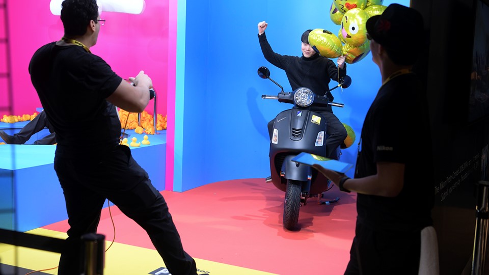 An attendee has his photo taken