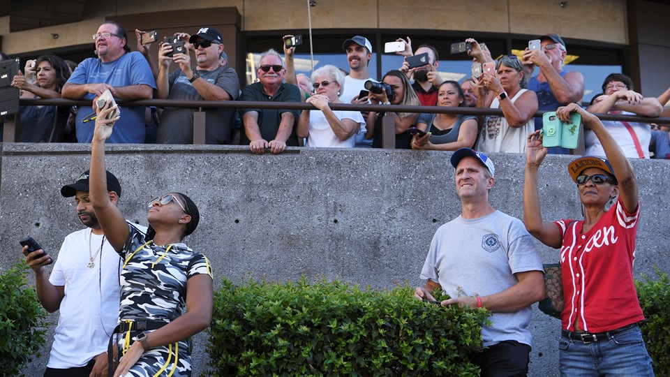 Fans watch the tire smoking action