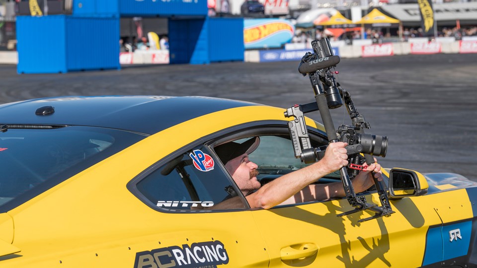 A cameraman grabs footage
