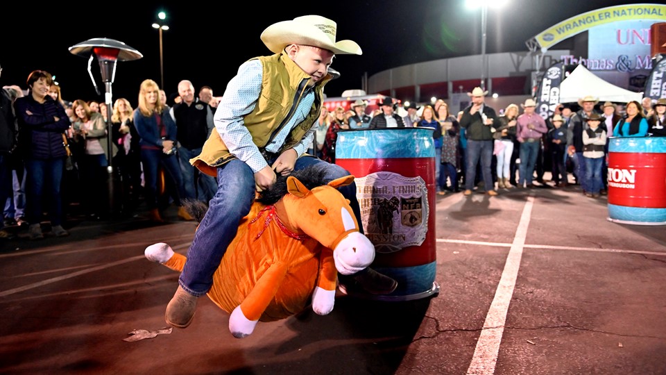 Fan Zone: Dalton Olson of Colorado participates in barrel race