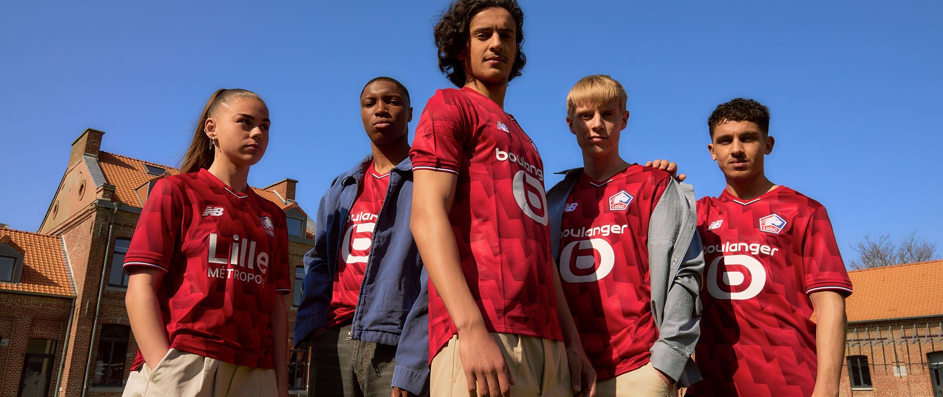 Boston MA May 27 2025 New Balance has today revealed the striking new LOSC Lille Home kit ahead of the 2025 26 season Unmistakably Lille the kit arrives in the club s iconic Team Red proudly showcasing an all over geometric print that delivers a modern expressive look The geometric pattern takes direct inspiration from the pentagon shape found in the LOSC crest an element itself inspired by the Citadel of Lille bringing a strong sense of identity and continuity to the design With confident energy and bold visual impact the new design embodies the mantra Fiers Forts F roces Proud Strong Fierce three words that capture the unwavering spirit of Les Dogues and their fans This 25 25 Home kit design also features a stylised fleur de lis graphic and accompanying text applied to the back neck of the jersey paying tribute to Lille s heritage and deep cultural connection to the city The shirt is complimented by classic navy shorts and socks subtly accented with