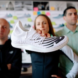 Team New Balance Athlete Jenny Simpson with the FuelCell 5280 Design Team