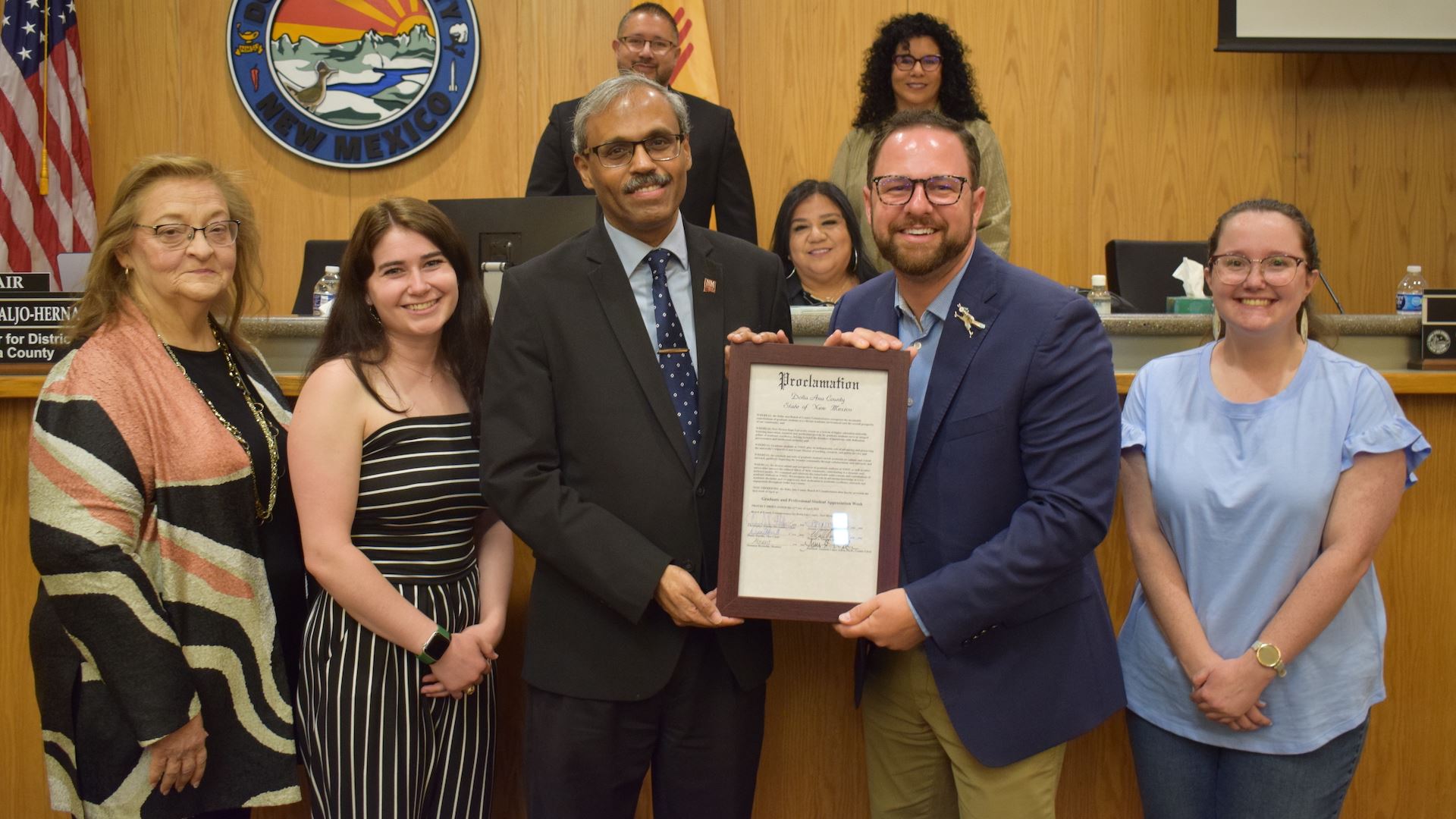 Photo of NMSU Graduate School being recognized by Do a Ana County Commission