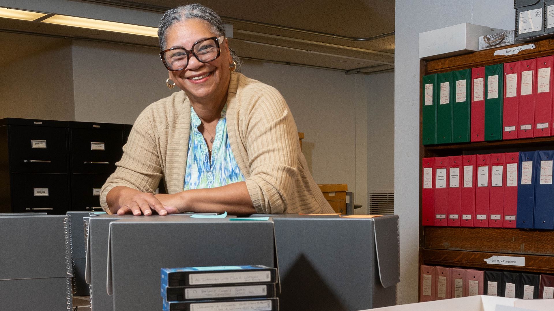 Photo of Lauretta King working on her Black Programs document preservation project