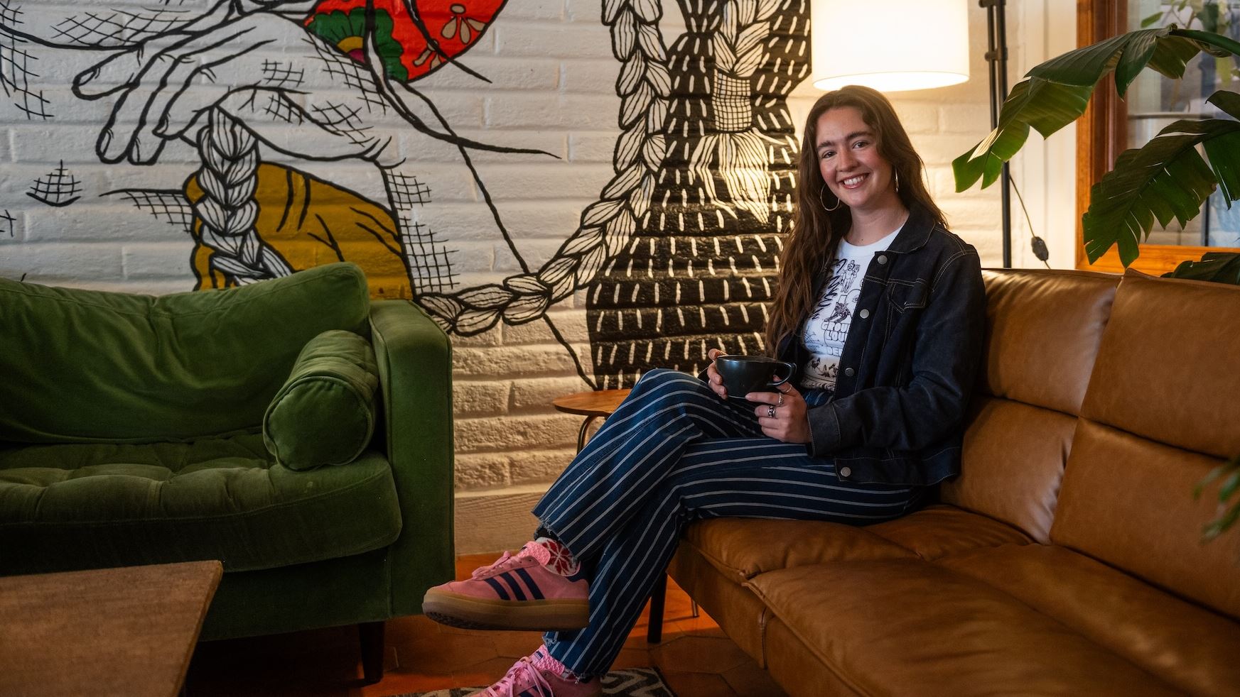 Photo of NMSU College of Business alumna Kendra Espiritu pictured at Grounded her family s locally owned business