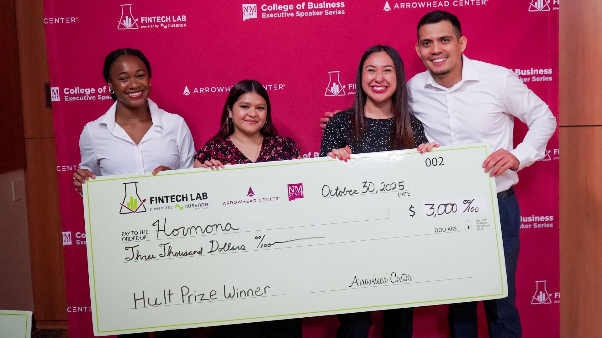 Photo of NMSU students Sydnee Johnson Alyssa Hernandez and Melissa Torres alongside Carlos Cuesta
