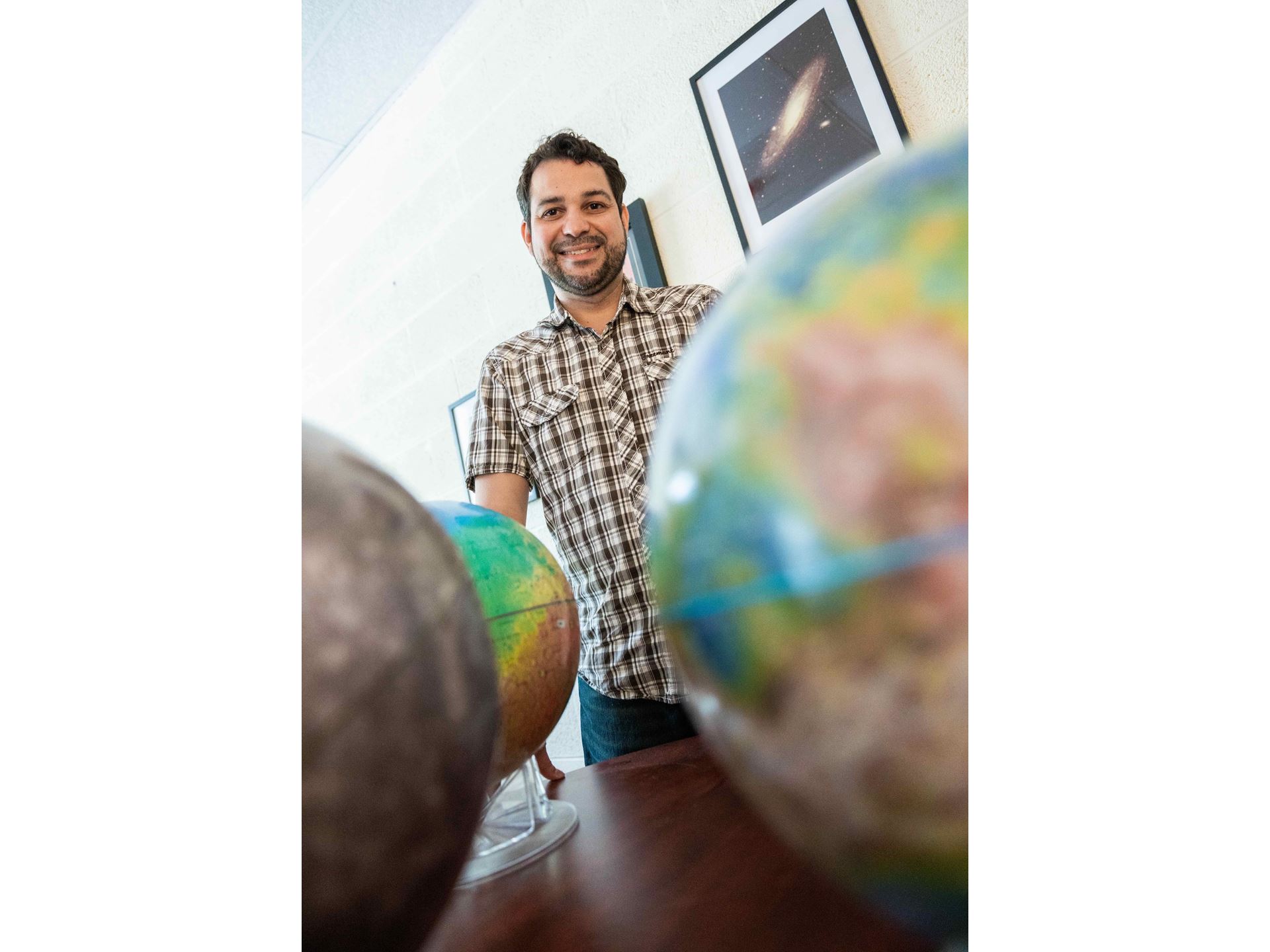 NMSU professor awarded NASA grant, research may show how Pluto was formed