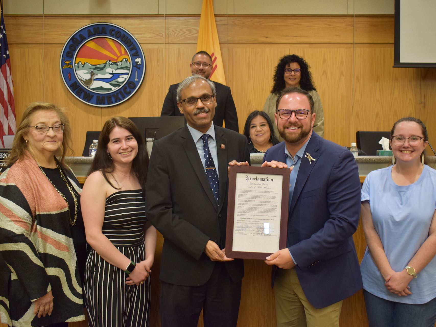 Photo of NMSU Graduate School being recognized by Do a Ana County Commission