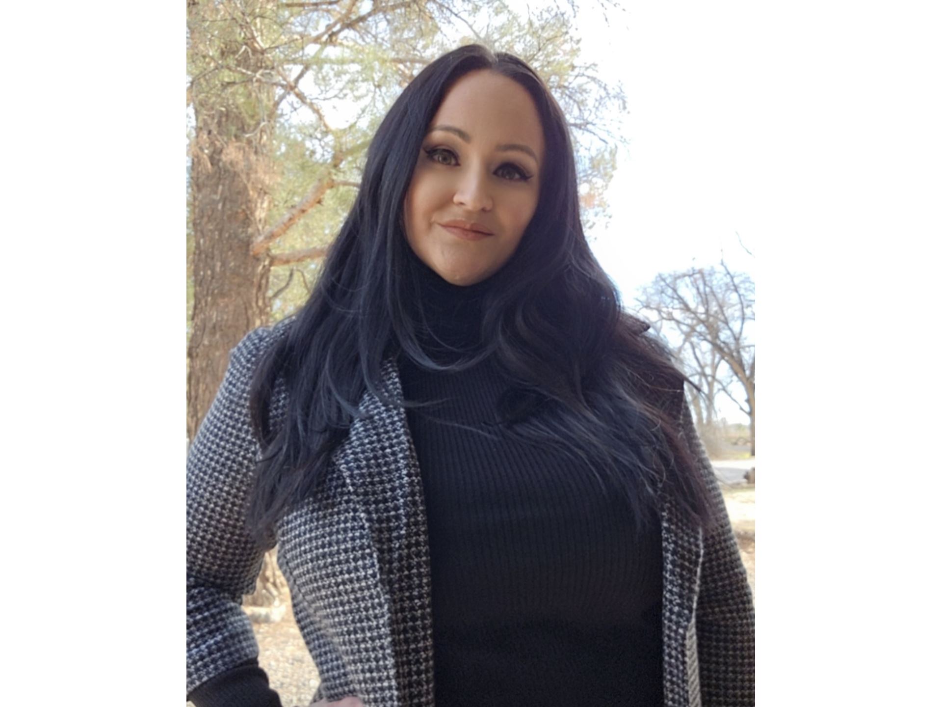 A woman from the chest up