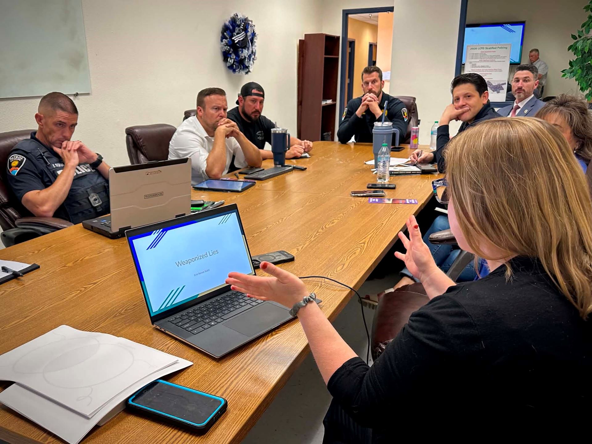 Photo of Erin Wahl associate professor with NMSU Library and command staff from LCPD