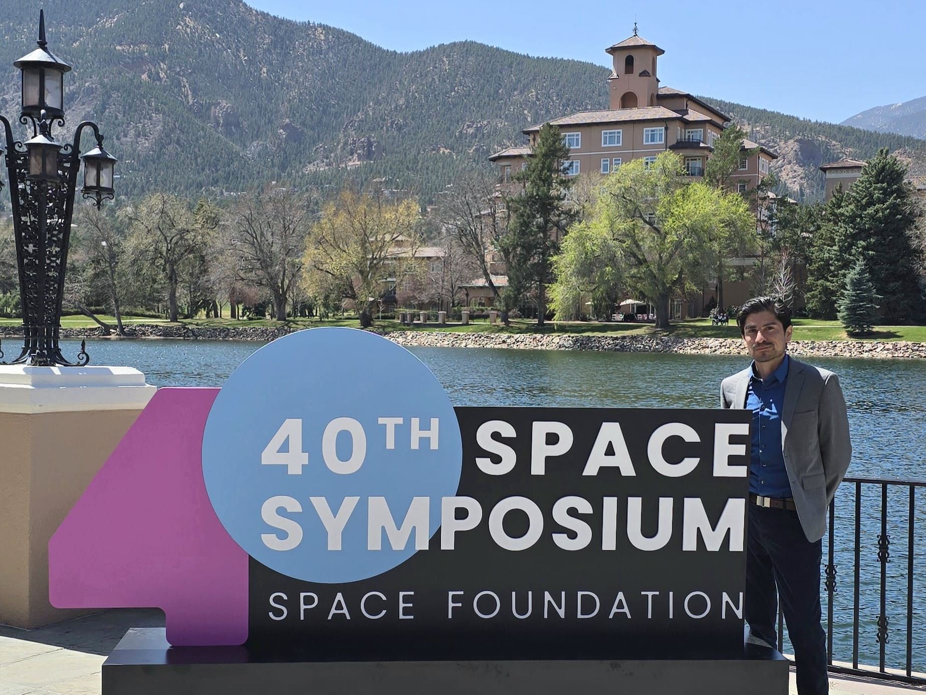 Photo of NM FAST client that received a micro grant to attend a conference to meet with potential clients and partners