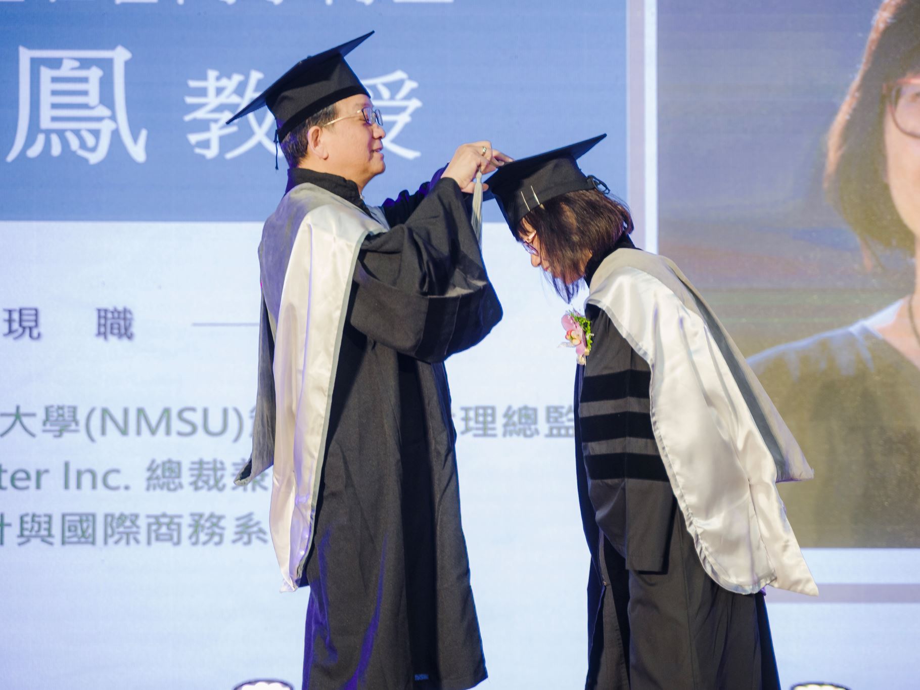 Photo of Winnie Lee being recognized at National Taipei University of Business