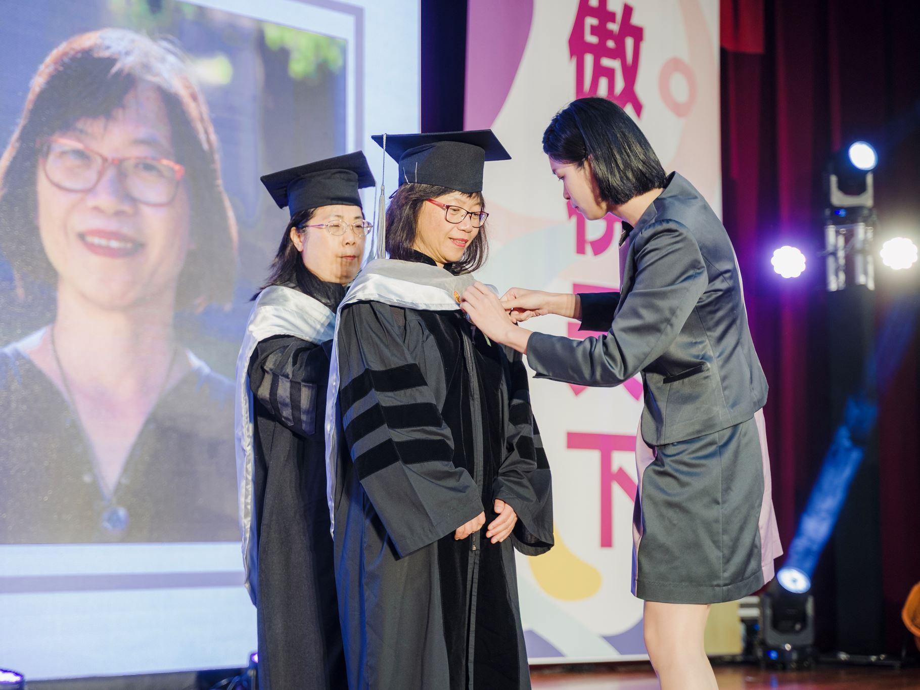 Photo of Winnie Lee being recognized at National Taipei University of Business