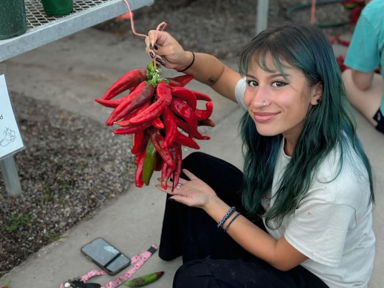 Photo of Alexis Olmos with chile