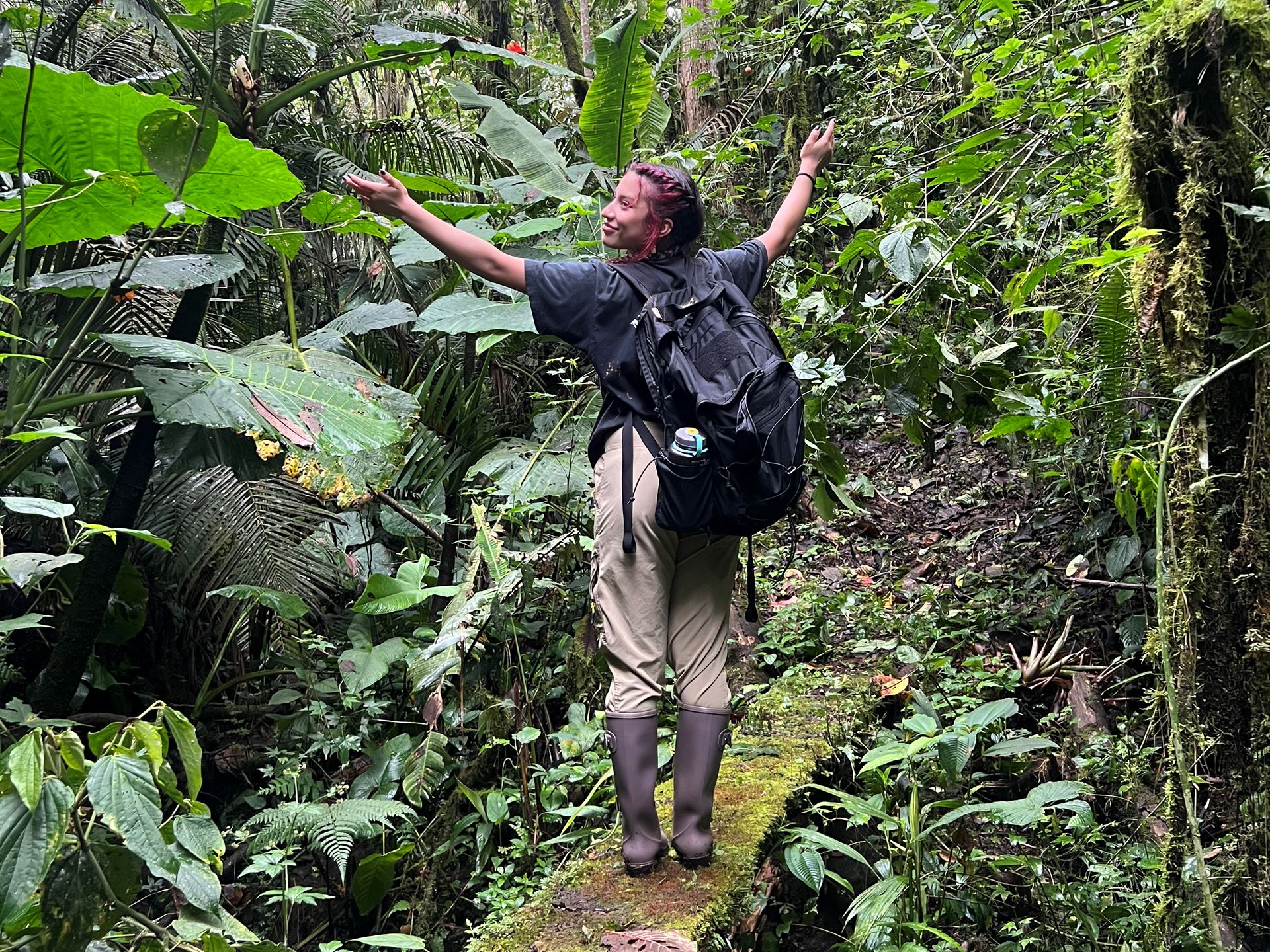 Photo of Alexis Olmos in Ecuador studying tropical insect ecology for a class