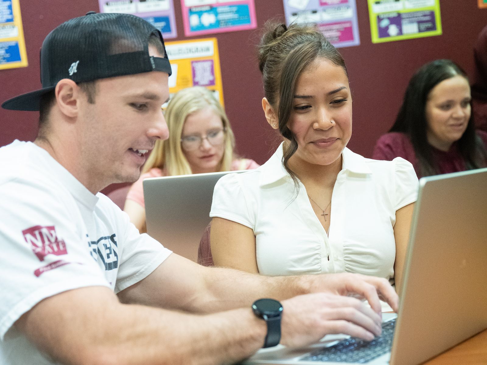 Photo of Blade Morris instructing Santana Cheromiah