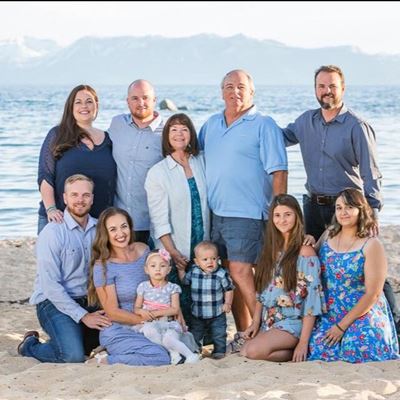 Gary Seipel, center, with his wife Sue, three sons and 7 grandchildren, celebrating their 50th wedding anniversary in La