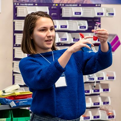 Innoventure High School Challenge participant Bella Roy, a student at Portales High School, describes the prototype she