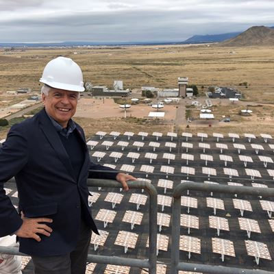 New Mexico State University Chancellor Dan Arvizu visited a solar energy facility at Sandia National Labs. Arvizu will a