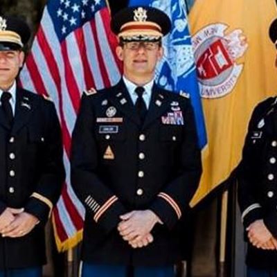 Three men in military uniform Newly commissioned officers 2nd Lt. Dominic LaVolpa, left, and 2nd Lt. Luis Pena with Lt.