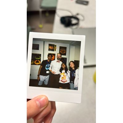 Photo of a polaroid photo in someone s hand
