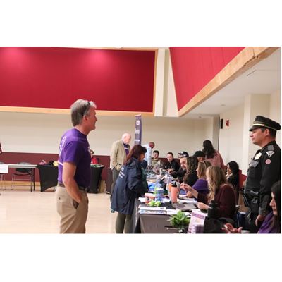 A man standing by a table