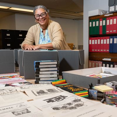 Photo of Lauretta King working on her Black Programs document preservation project