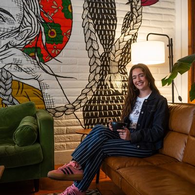 Photo of NMSU College of Business alumna Kendra Espiritu pictured at Grounded her family s locally owned business