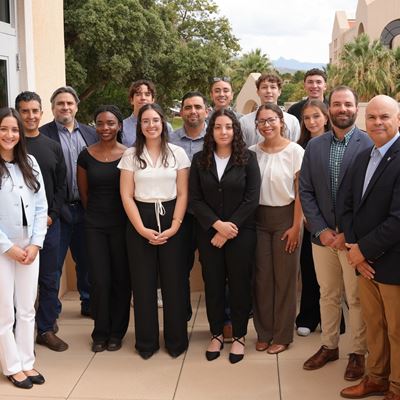 Photo of GM top executives with College of Business supply chain program students