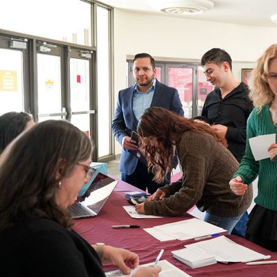 Photo of students checking in at the Bold Idea Conference