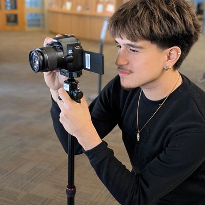Photo of student in NMSU Library Loanable Technology Program