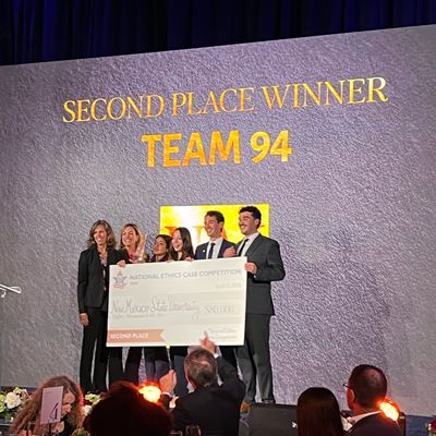 Photo of NMSU COB undergraduates Jacob Acosta Natalia Ochoa Macy Silva and Noah Torres