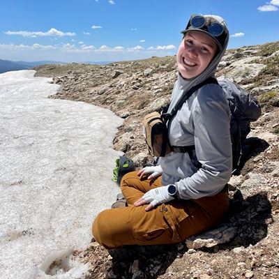 Whitney Watson a third year Ph D student searches for rosy finches on Big Costilla Peak at Vermejo Park Ranch