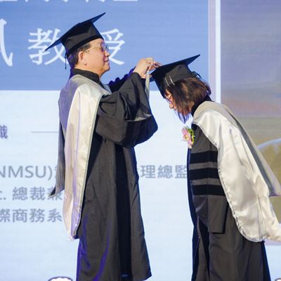 Photo of Winnie Lee being recognized at National Taipei University of Business