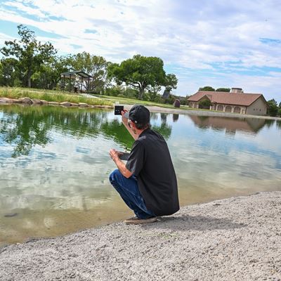 Photo of Alumni Pond during restock 2026