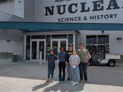 Description Five students attending New Mexico State University s NuChemE Pipeline summer initiative are standing in front of the National Museum of Nuclear Science History