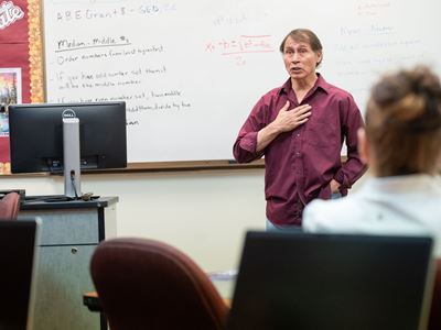 Photo of Ron Morales instructing students