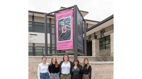 Five women standing together