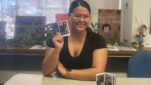 Photo of Destiny from Women in STEM League WSL with a zine